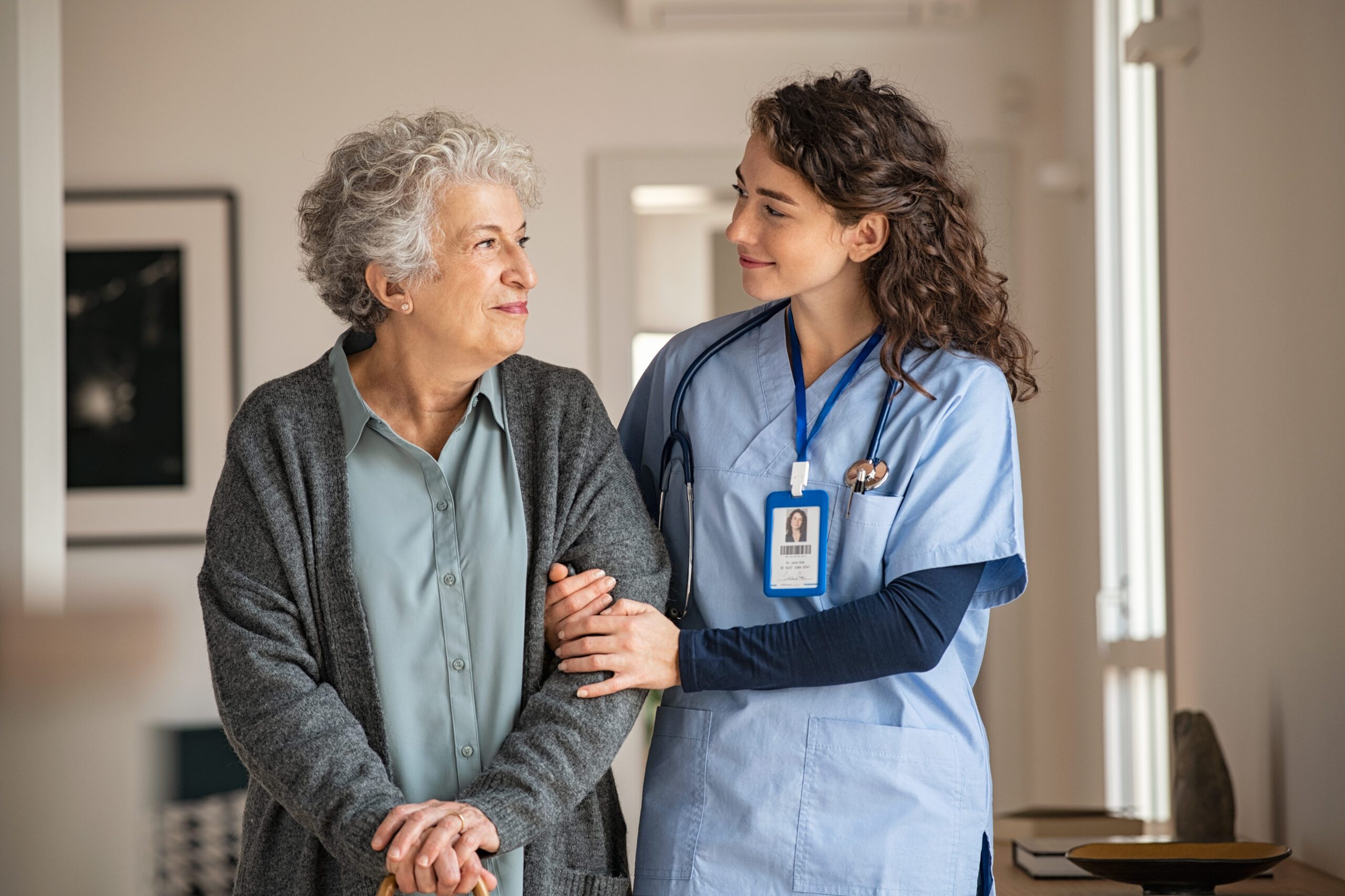 Nurse Assisting Senior Women
